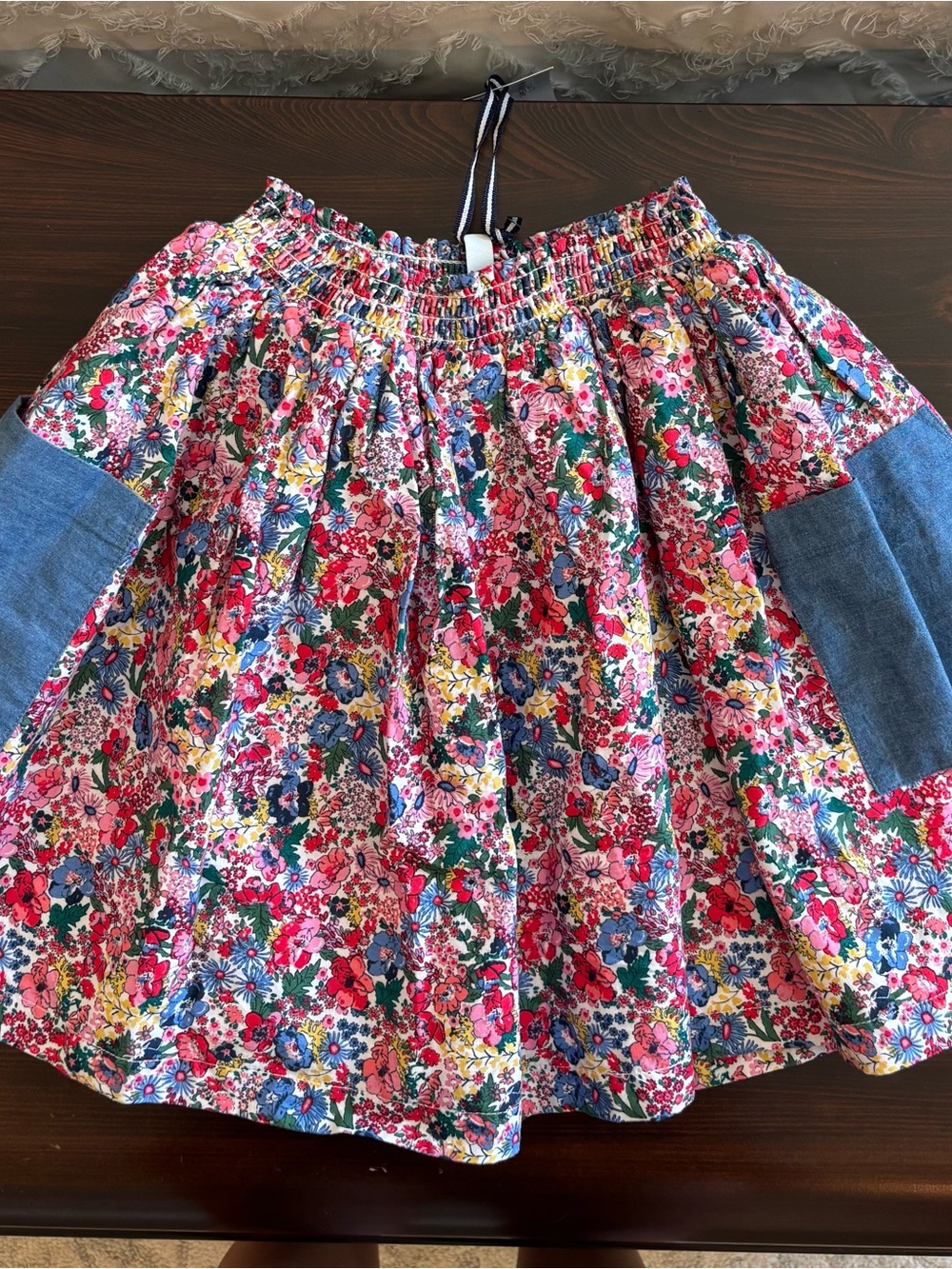 Joules Floral Smocked Waist Skirt in Pink Multi with Denim Pockets